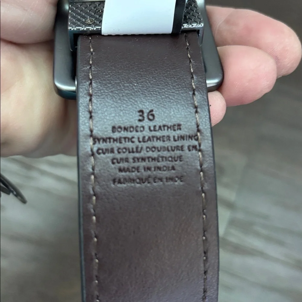 True Religion Bonded leather,synthetic leather lining,reversible stainless steel